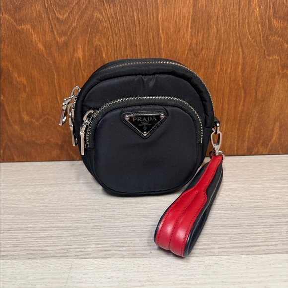 Prada Handbags - Prada Tessuto Round Wristlet